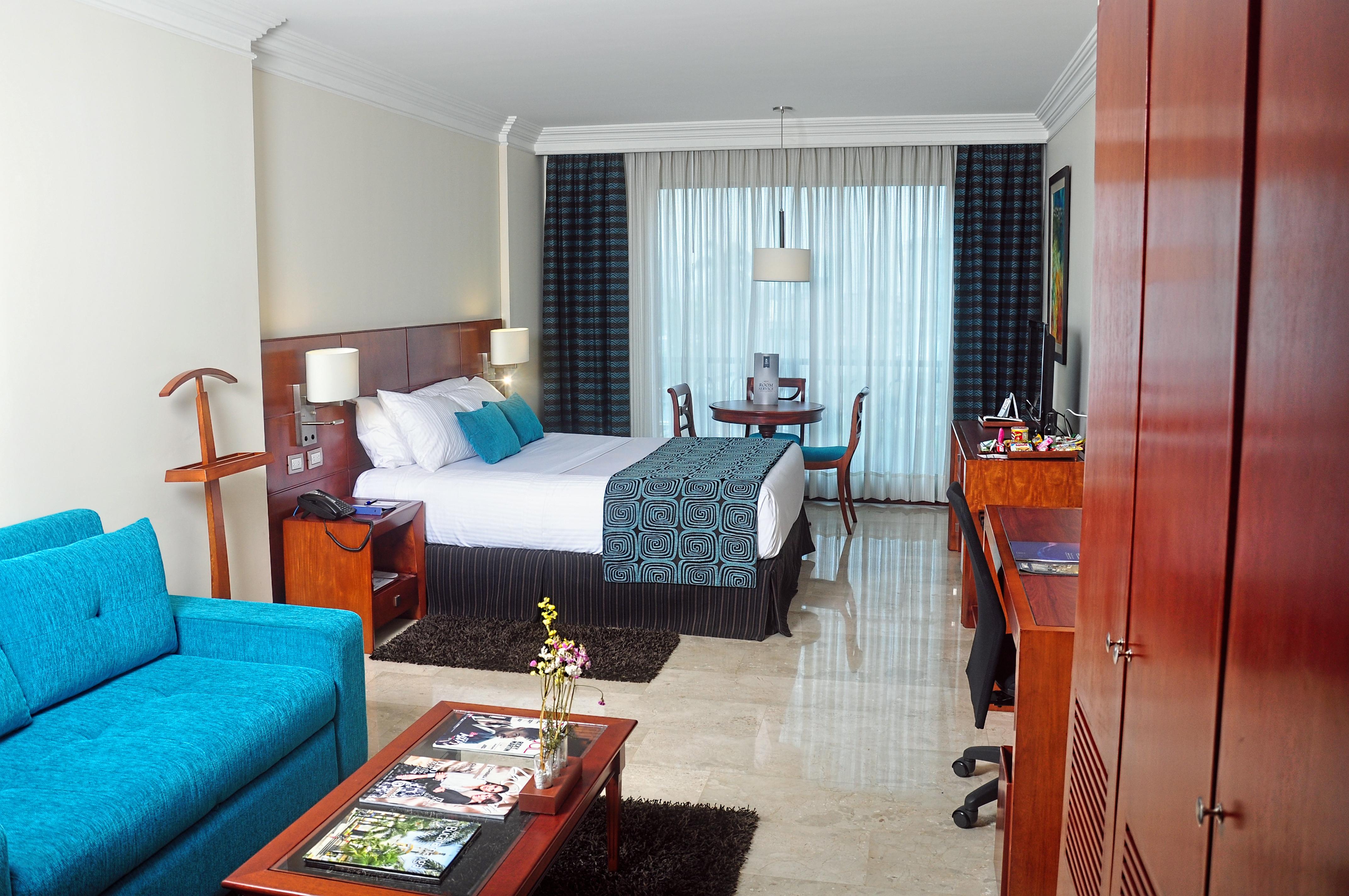 Hotel Dann Carlton Bucaramanga Bagian luar foto A room at the hotel